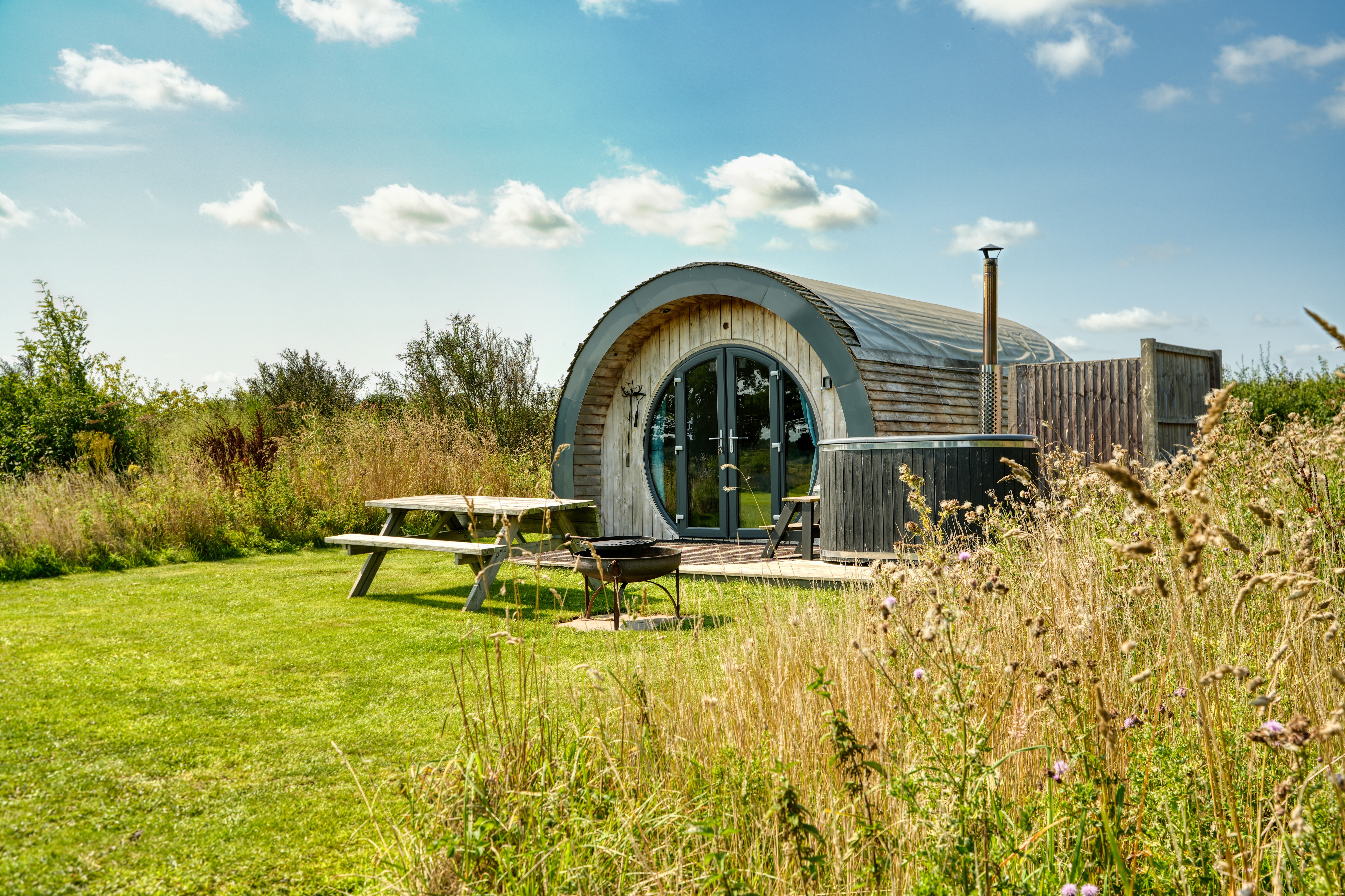 Luxury Waterside Glamping Pod with Hot Tub & King & Bunk