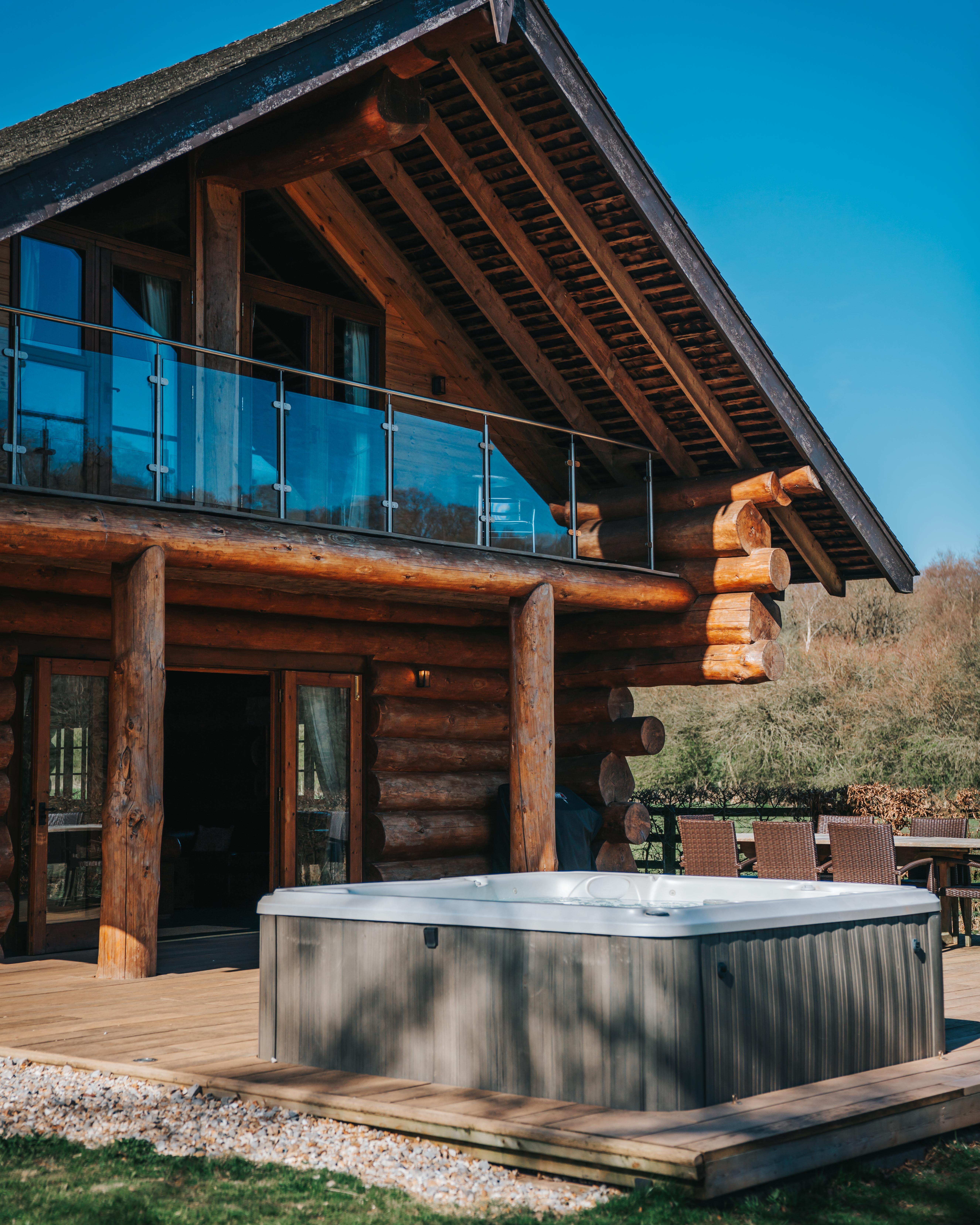 Luxury log cabins with hot tubs and river views